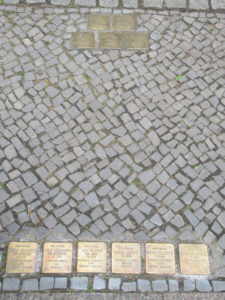 Stepping Stones - simple memorials in Berlin marking the houses where Jewish Holocaust victims lived before deportation, forcing people to confront the reality of the Holocaust as they move through the city.