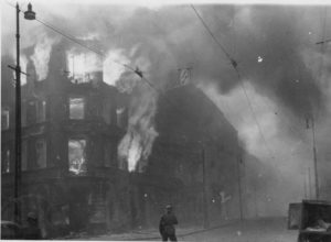 Image of building being burned in the Warsaw Ghetto Uprising