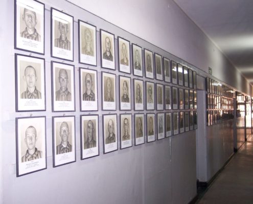 Bloc 11 in Auschwitz shows the images a photographer took of prisoners upon their arrival at the camp these images were used to identify prisoners if they were to escape.