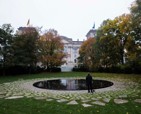 Sinti-Roma memorial, surrounded by nature, overlooking the German Parliament. (Credit: http://www.spiegel.de/international/germany/monument-to-sinti-and-roma-murdered-in-the-holocaust-opens-in-berlin-a-863212.html)