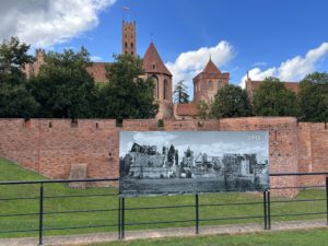 Present Day Malbork Castle, along with Malrbork Castle in 1945. Photo by Kennedy Snyder.