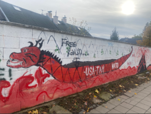 Elementary school mural altered into anti-US sentiment in Liberec, Czechia. Photo By Ian Eisenbrand.