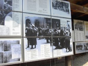 Image from the Topography of Terror Museum with a panel showing German Jews being deported to their deaths. Despite her insistence of being only an onlooker in the capturing of Jews, Stella Goldschlag was still responsible either directly or indirectly for hundreds of German Jews being sent to concentration camps and their eventual deaths. Photo credit: Public domain image by Adam Carr, posted on Wikipedia